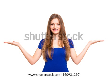 Beautiful woman making a scale with her arms wide open, isolated in a white background Royalty-Free Stock Photo #140931397