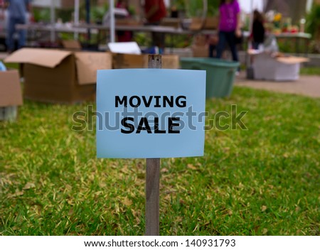 Moving sale in an american weekend on the yard green lawn