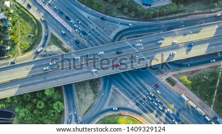 Aerial view of Kota Kinabalu city Highway. Aerial top view of highway with traffic cars and street above bridge.