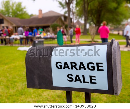Garage sale in an american weekend on the yard green lawn