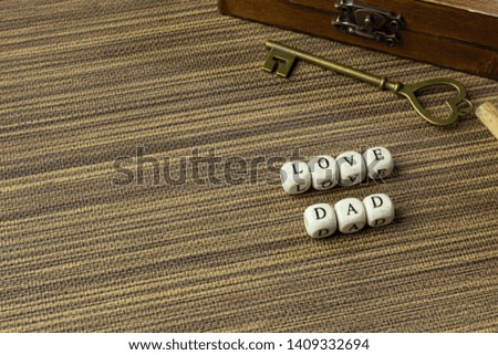 The wooden text  for father day content close up image.