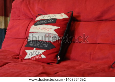 Red Pillow at Red Sofa