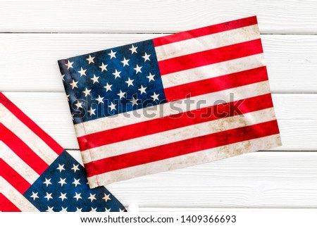 Memoral day of United States of America with flag on white wooden background top view