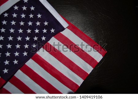 Usa flag on black leather.