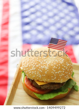 Tasty Hamburger with American flag with  background of Amercan flag