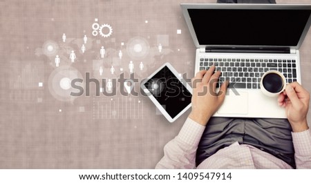 Top view man using a laptop