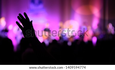 blurred, silhouette hands raising for religion background