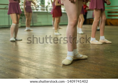 legs of little ballerin in pose