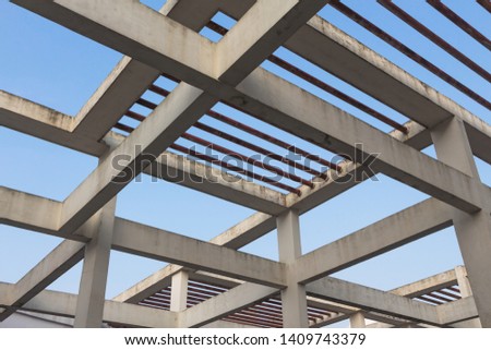 Geometric mesh composed of many beams on the top of a high-rise building