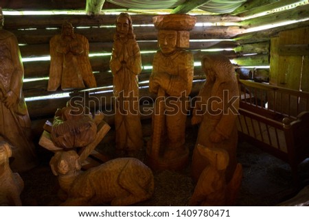 Old wooden house and carved figures in Bethlehem