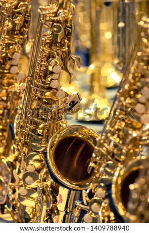  close-up of Saxophone, isolated in the background of dreamlike lights