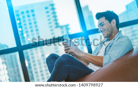 Businessman with smartphone using face ID recognition system.Biometric identification,verification face detection,Facial recognition system,Unlocking technology concept. Royalty-Free Stock Photo #1409798927