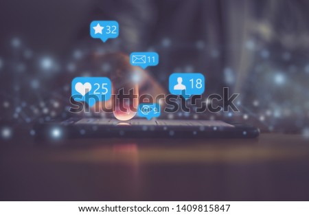 Young man using smart phone,Social media concept. Royalty-Free Stock Photo #1409815847