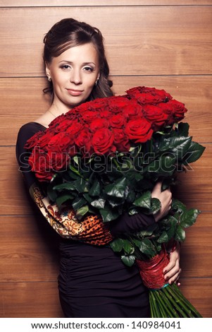 Happy girl with roses