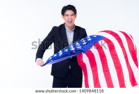 A business man is waving the American flag with pride on the white background for remebrance of independence day on 4th of July