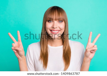 Close up photo of attractive nice satisfied lady youth make v-signs weekend free time summer holidays dressed fashionable youngster clothing isolated teal background