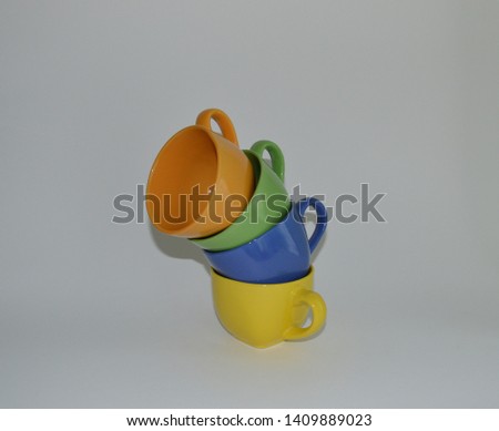 Colorful ceramic caps for tea.