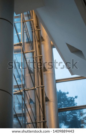 Steel cables, anchors and glass panels