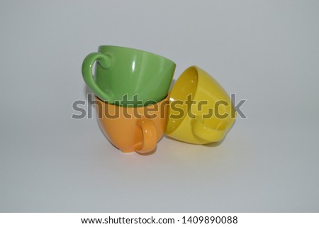 Colorful ceramic caps for tea.