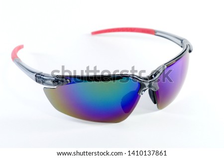 Safety glasses are used to working in chemical plants or construction projects.. The color of the lens is rainbow colored and has a white background.
