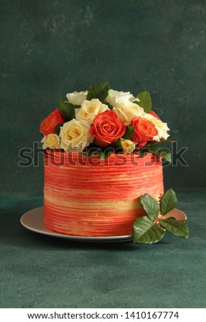 
Orange cake with fresh flowers