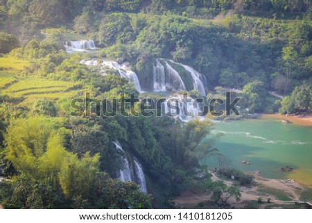 Ban Gioc Waterfall is one of Vietnam’s best-known waterfalls,Ban Gioc is the beautiful largest waterfall in the country, top view of green forest waterfall