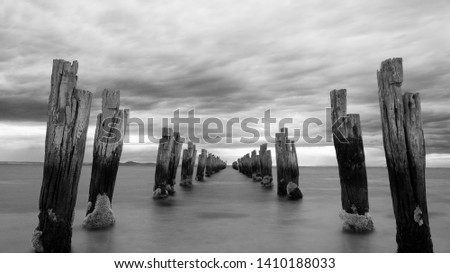 Black and White photo of Abandoned Pier with Cloudy Skies - Victoria 