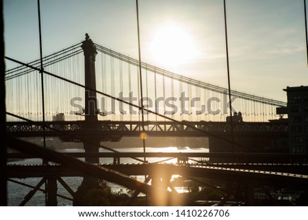 Manhattan bridge from Brooklyn bridge sunrise