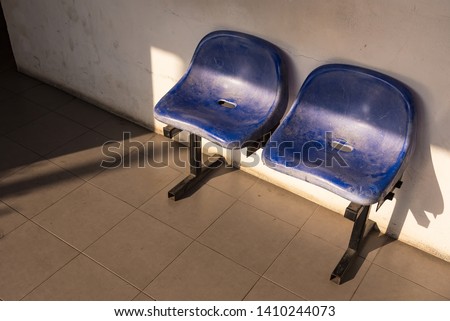 Waiting chair in front of the public toilet