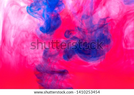 blue and red paint diluted in water