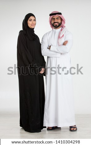 Studio Portrait of arab couple  Royalty-Free Stock Photo #1410304298