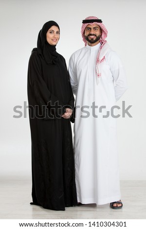 Studio Portrait of arab couple  Royalty-Free Stock Photo #1410304301