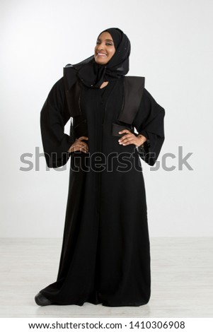 Studio portrait of Emirati woman Royalty-Free Stock Photo #1410306908