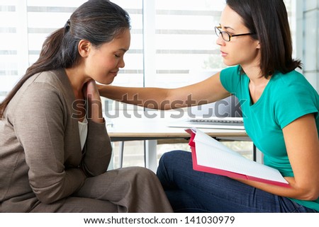 Woman Having Counselling Session Royalty-Free Stock Photo #141030979