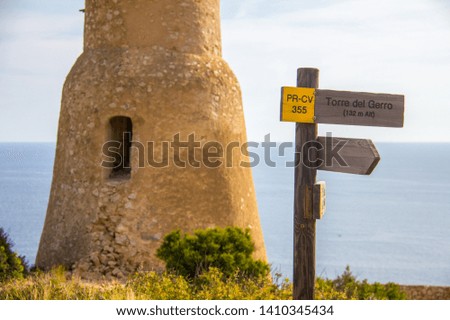 Torre del Gerro tower. Ancient 16th century watchtower on the top of a cliff in Denia, Spain