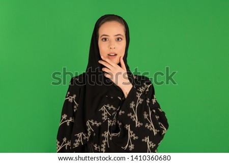 Studio portrait of arab woman Royalty-Free Stock Photo #1410360680