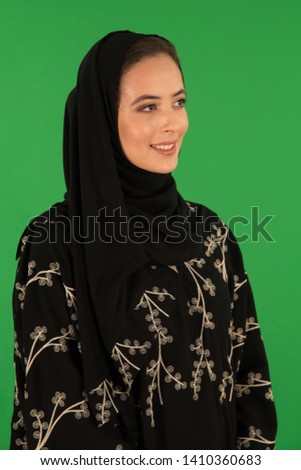 Studio portrait of arab woman Royalty-Free Stock Photo #1410360683