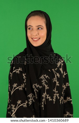 Studio portrait of arab woman Royalty-Free Stock Photo #1410360689