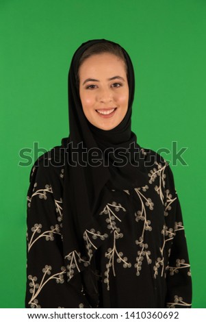 Studio portrait of arab woman Royalty-Free Stock Photo #1410360692