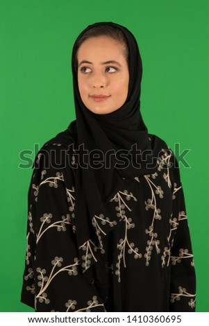Studio portrait of arab woman Royalty-Free Stock Photo #1410360695