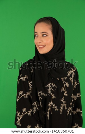 Studio portrait of arab woman Royalty-Free Stock Photo #1410360701