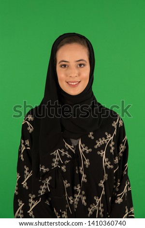 Studio portrait of arab woman Royalty-Free Stock Photo #1410360740
