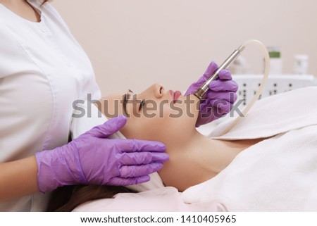 Procedure of Microdermabrasion. Healthcare clinic cosmetology. Royalty-Free Stock Photo #1410405965