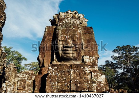 ancient head in temple in Cambodia