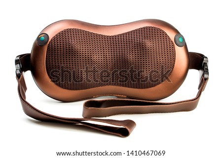 electric massager massage pillow on a white background Royalty-Free Stock Photo #1410467069