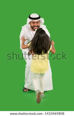 arab father playing with daughter Royalty-Free Stock Photo #1410469808