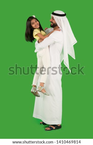 arab father playing with daughter Royalty-Free Stock Photo #1410469814
