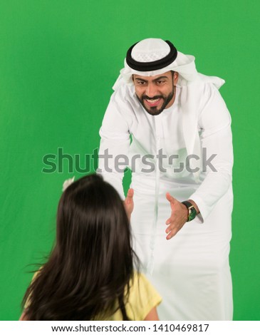 arab father playing with daughter Royalty-Free Stock Photo #1410469817