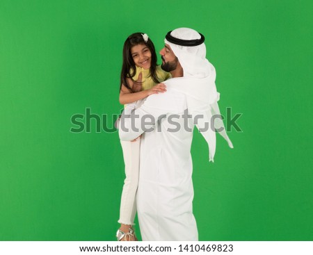 arab father playing with daughter Royalty-Free Stock Photo #1410469823