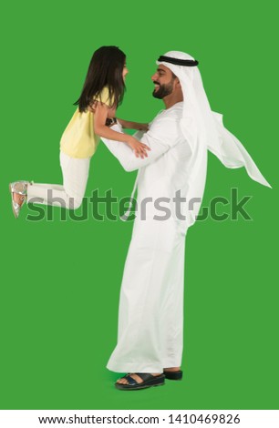 arab father playing with daughter Royalty-Free Stock Photo #1410469826